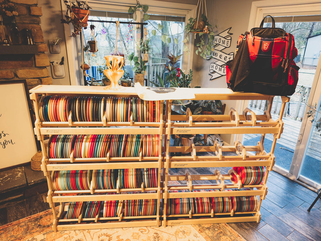 Four-Pack Stackable Disc Golf Storage Rack System with Top Shelf