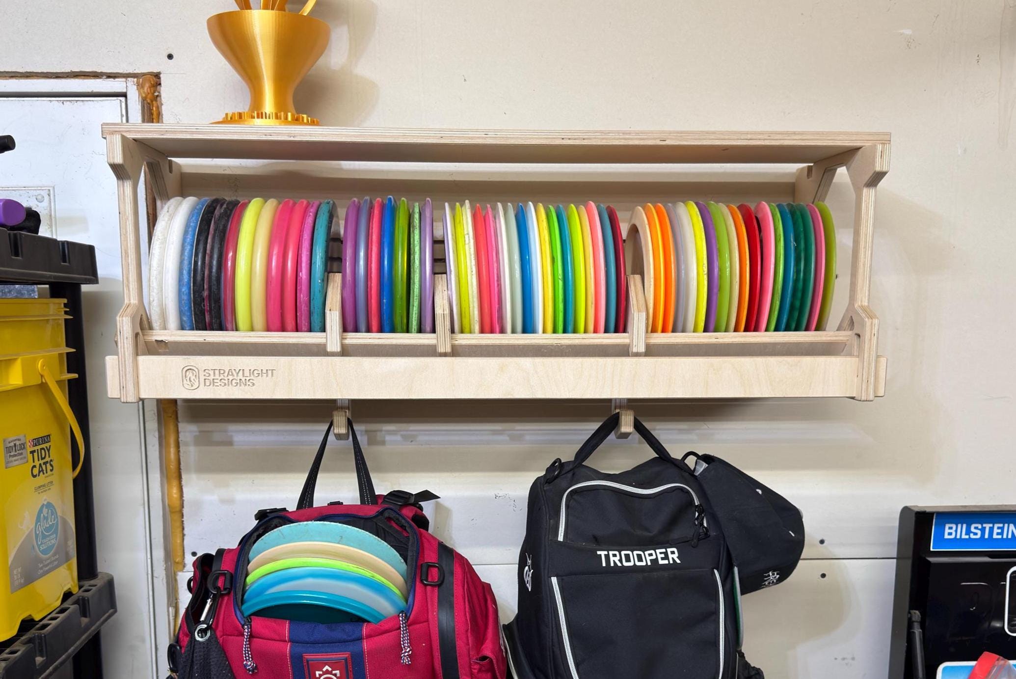 Wide Wall-Mounted Disc Golf Storage Rack with Shelf and Bag Hooks, Holds 50–60 Discs